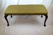 Green upholstered stool