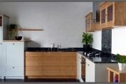Chestnut and painted kitchen with cosmic black granite worktops