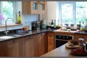 Faceframe oak kitchen with tan brown granite worktop