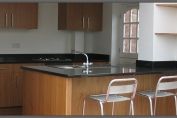 Oak overlay kitchen with star galaxy granite worktops