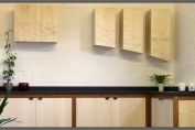 Brown oak and sycamore kitchen with anciento black granite worktops