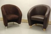 One leather one fabric tub chairs