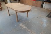 Extending oak dining table
